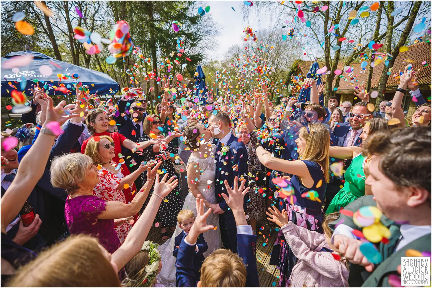 Colourful Confetti wedding photo from Chevin Country Park in Otley, Yorkshire Wedding Photography at Chevin Country Park, Yorkshire Park Run Wedding,