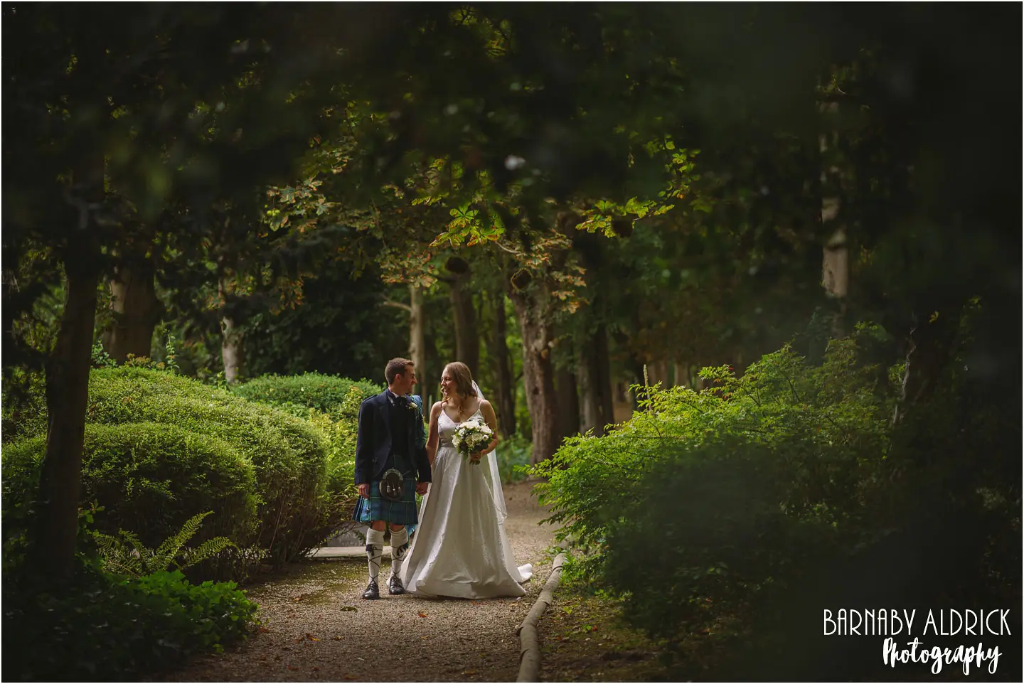 Goldsborough Hall woodland walk wedding photos near Knaresborough and Harrogate by Yorkshire Wedding Photographer Barnaby Aldrick