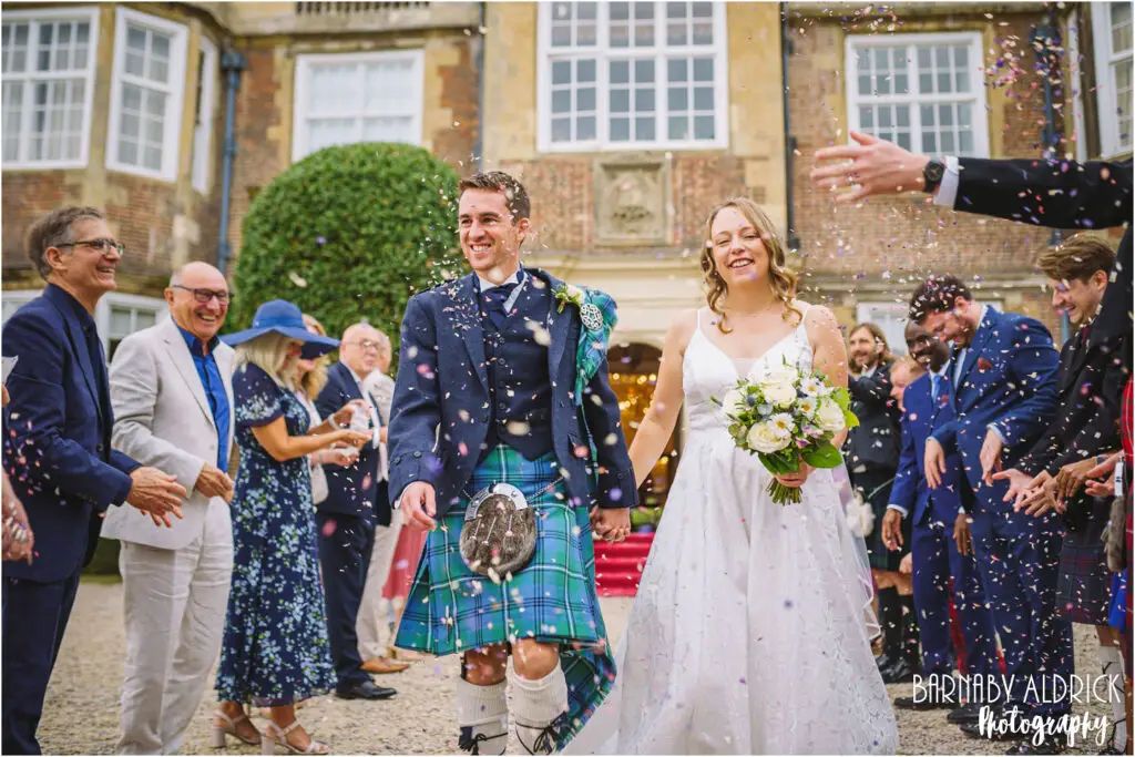 Goldsborough Hall Confetti Tunnel wedding photos near Knaresborough and Harrogate by Yorkshire by Barnaby Aldrick Wedding Photography