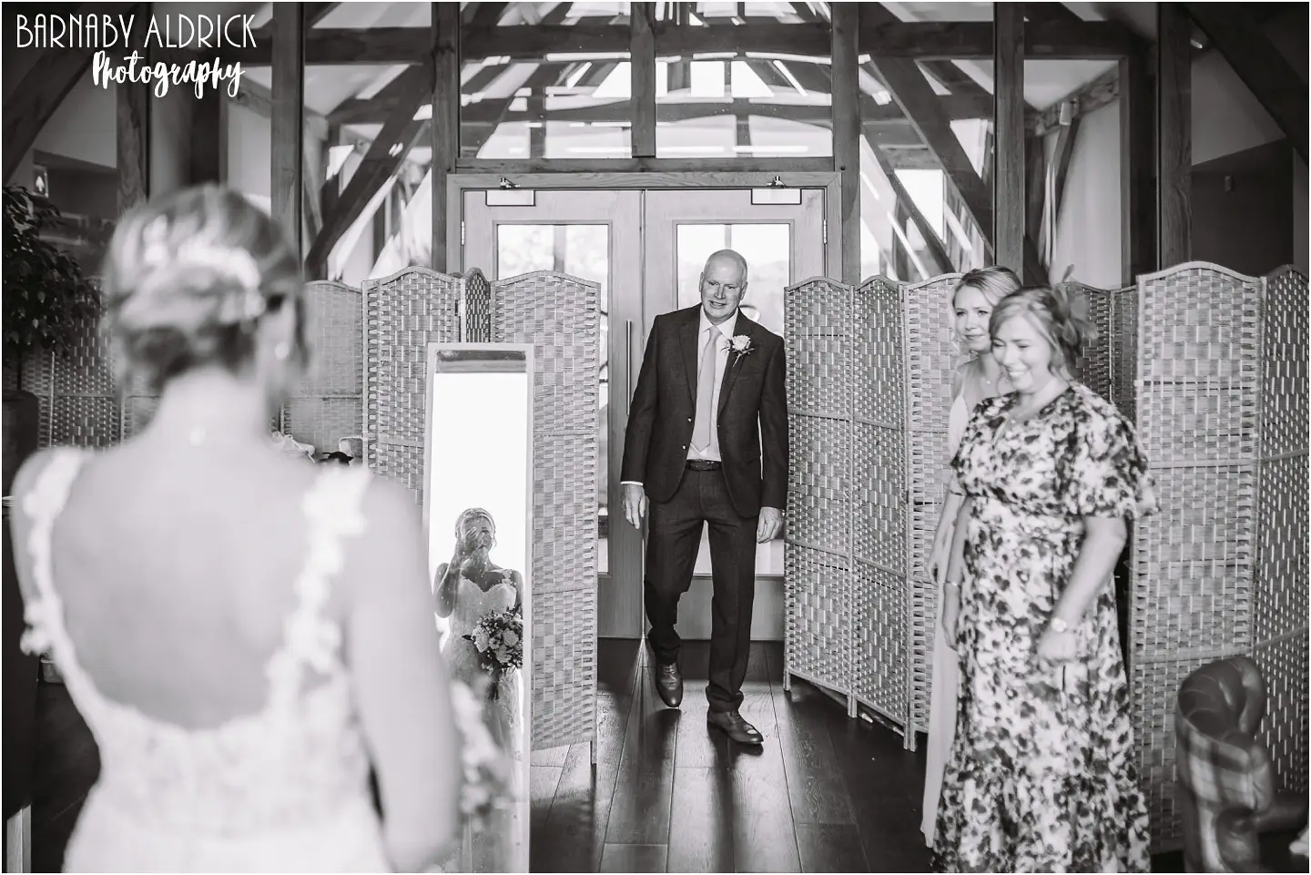 Father daughter first look wedding photo at Sandburn Hall near York in Yorkshire