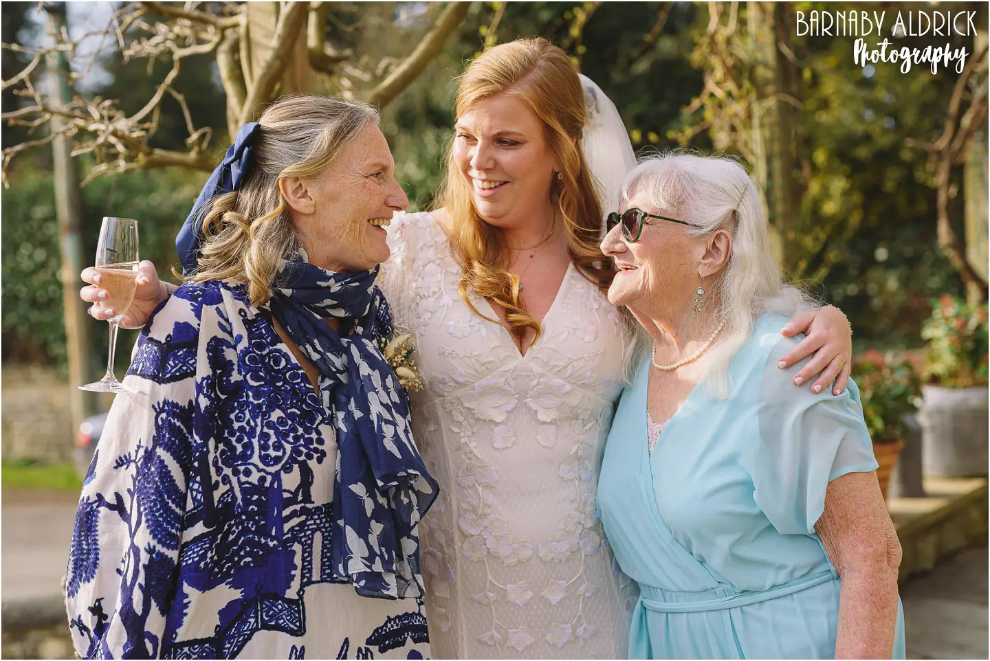 Candid wedding photo of 3 generations at a wedding at The Pheasant in Harome 