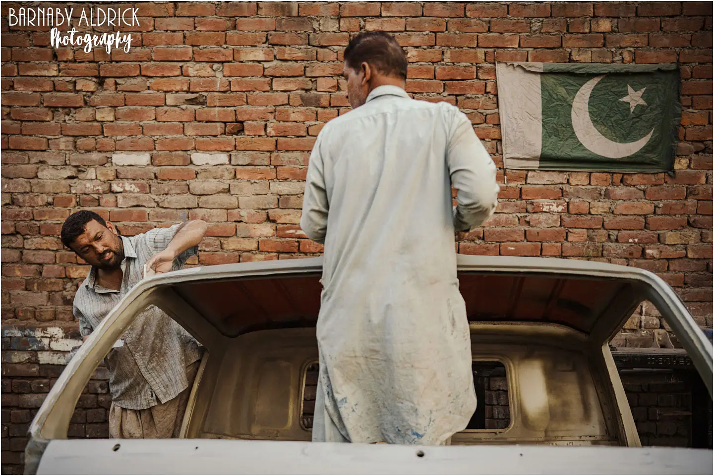 Pakistan travel photography 2026, Car repairers in Lahore Pakistan 2026