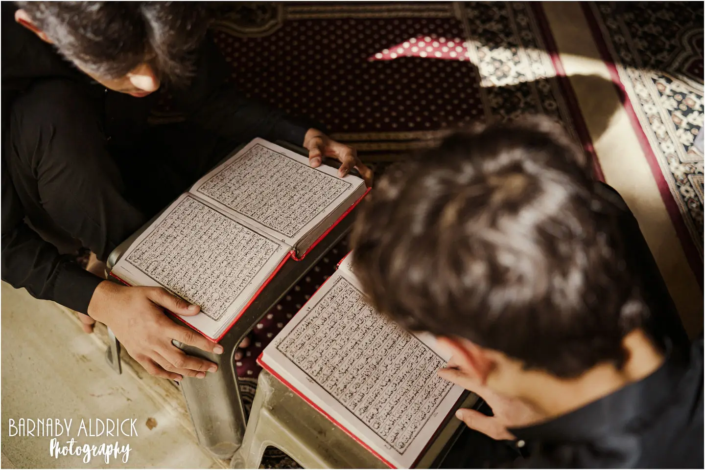 Teenagers reading the Quran at Masjid-e-Tooba in Karachi Pakistan