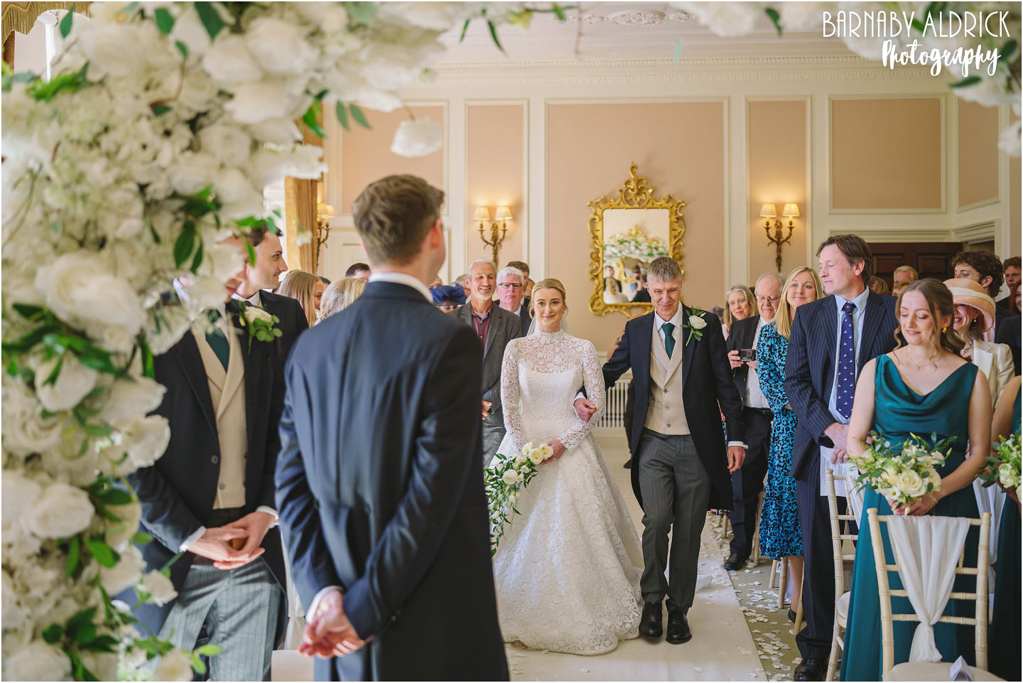 Wedding ceremony photography in the elegant Bowcliffe Room at Bowcliffe Hall near Leeds in Yorkshire