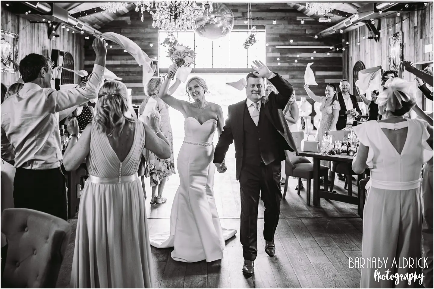 The South Barn fun wedding entrance photograph at Wharfedale Grange