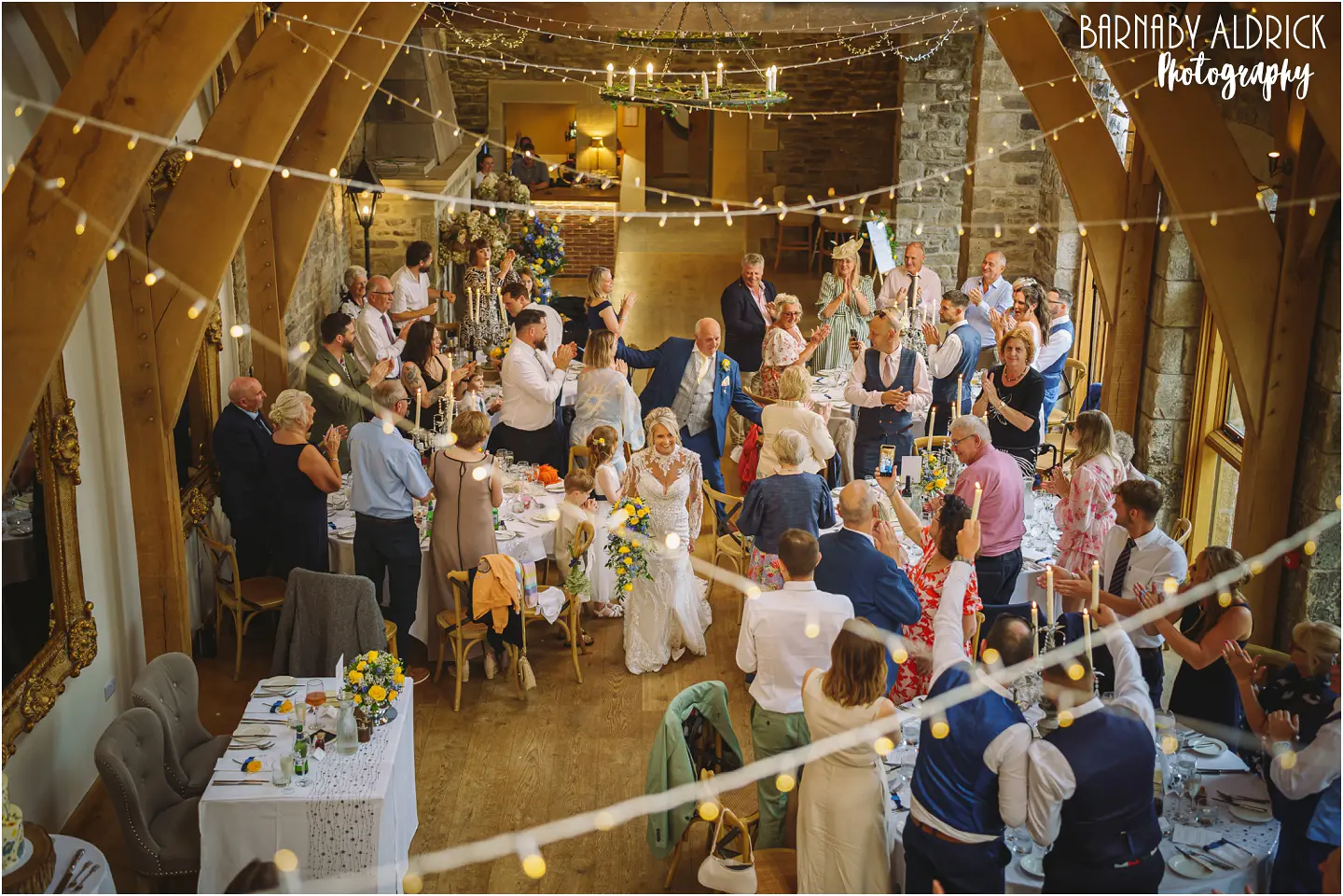 Entrance of the wedding couple into The Bell Barn at Tupgill Park