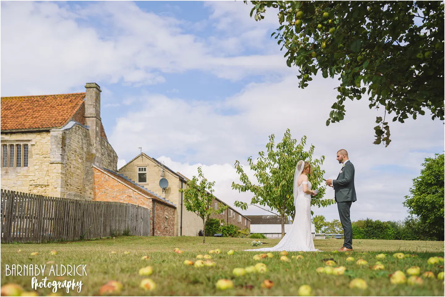 Private Wedding vows in the orchard at Priory Cottages in Yorkshire