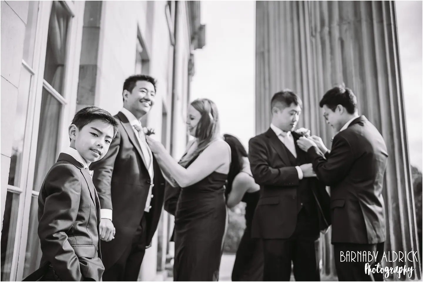 Candid groomsmen photos at the mansion in Roundhay Park in Leeds Yorkshire